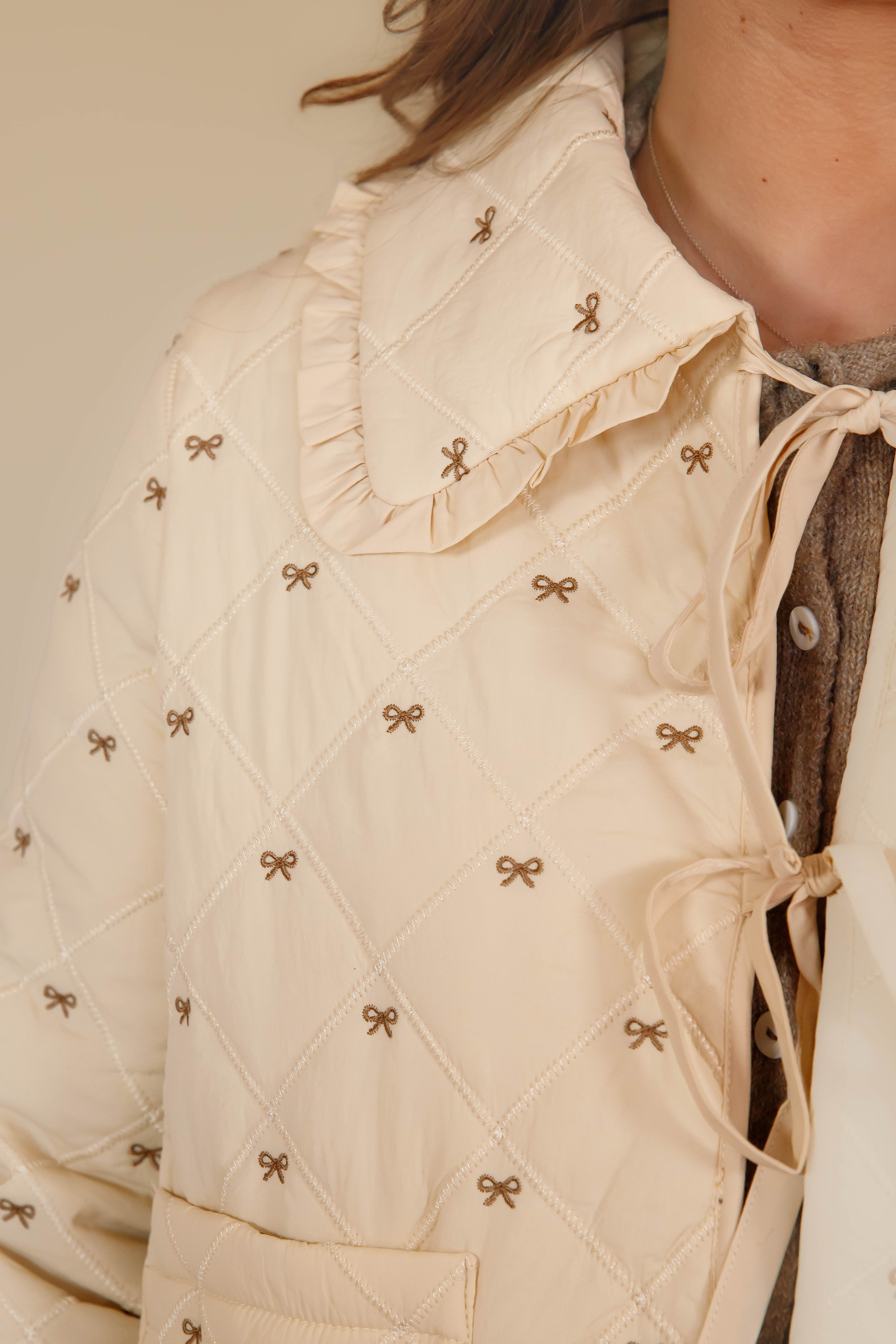 She's The Most Darling Quilted Bow Coat